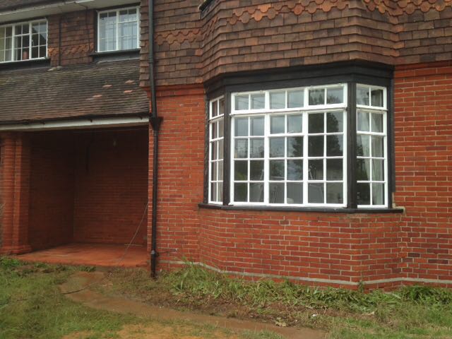 Exterior view of a home's brick wall after restoration